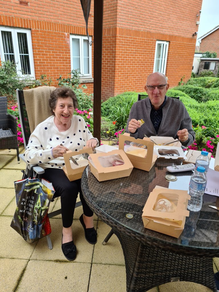 Tenants enjoying lunch in the garden --Aztec House