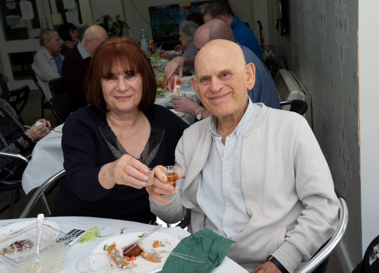 Tenants having lunch & l'chaim-- Aztec House