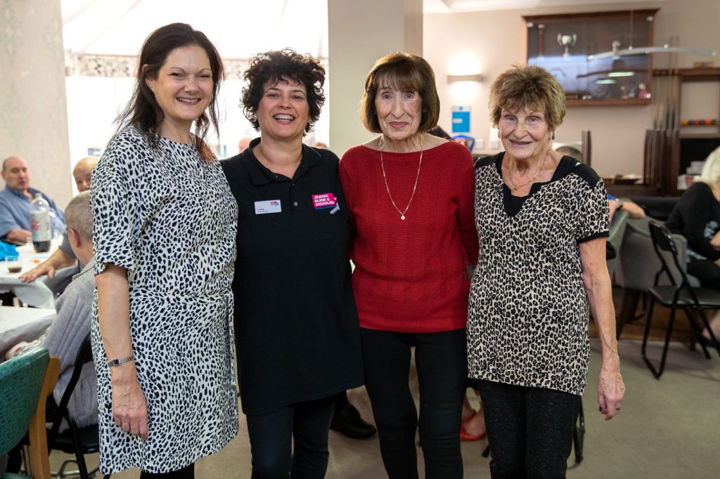 Staff with Volunteers--Aztec House