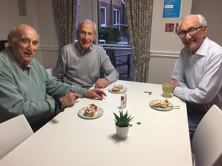 Gentlemen enjoying dessert --Milne Court