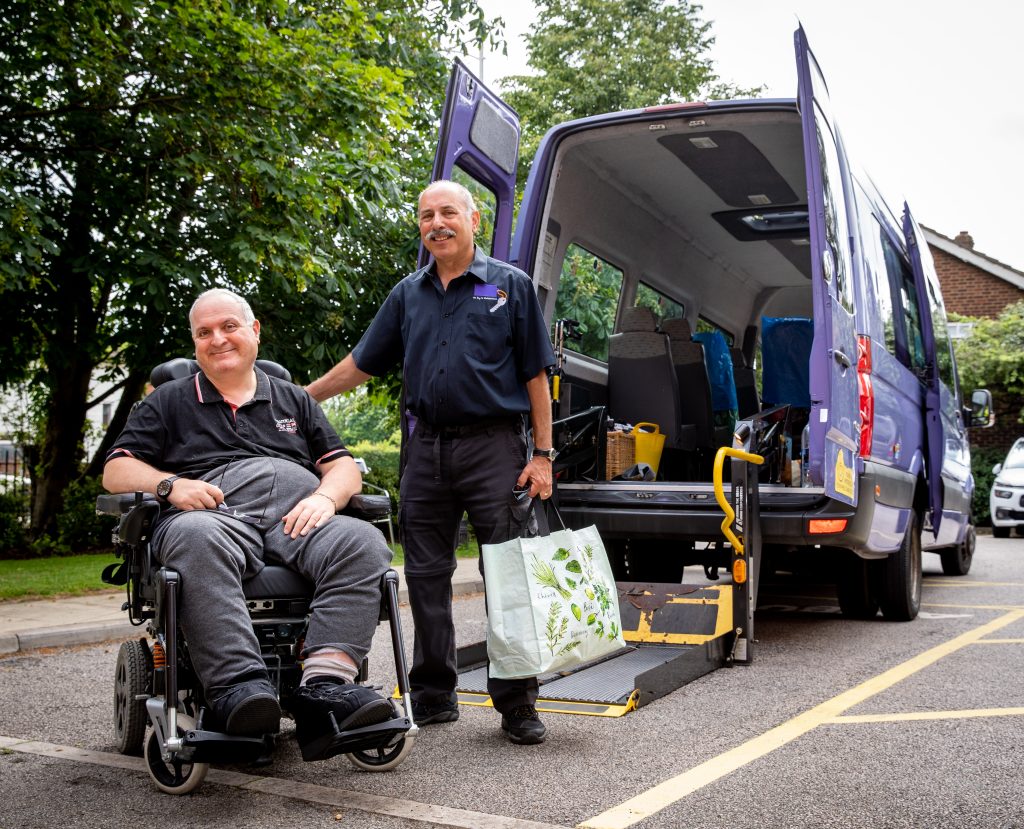 Tenant Gary with Bus driver Rob by bus