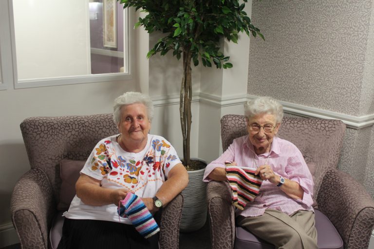 Tenants with knitting --Milne Court
