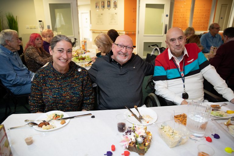 Tenants enjoying lunch --Cecil Rosen Court